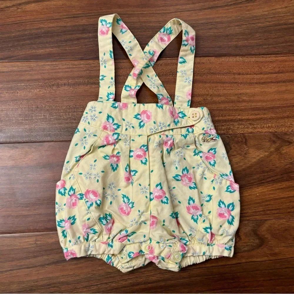 Lacoste vintage yellow floral shorts with suspender/overall straps.